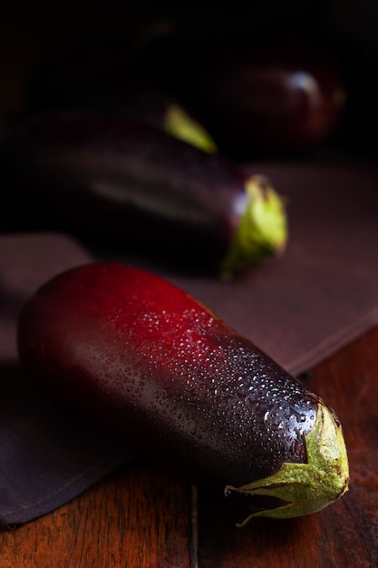 Fresh raw eggplants arrangement