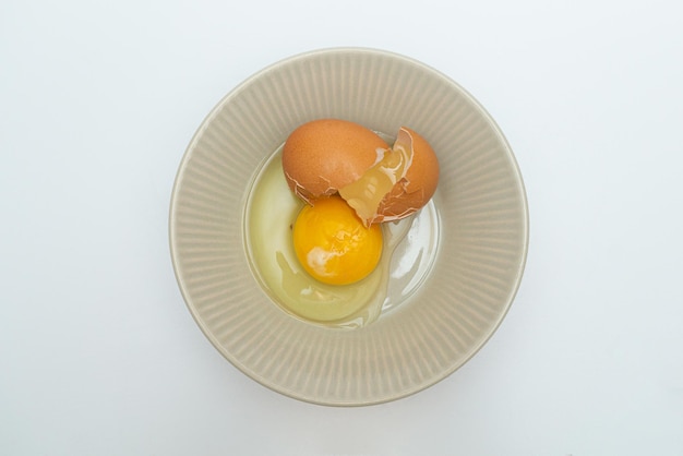 Fresh raw eggs in a bowl concept