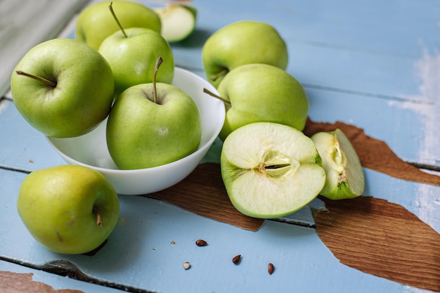 Fresh raw green apples on the wooden background Healthy food Juicy fruits for all