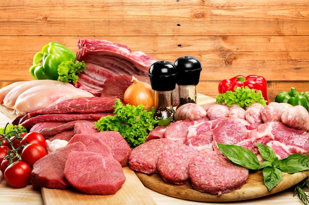 Fresh Raw Meat Background with vegetables