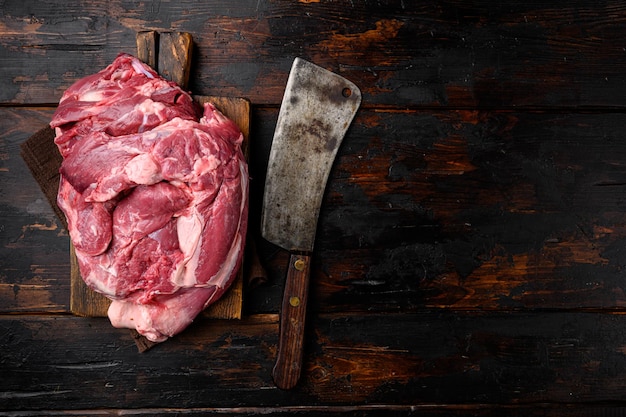 Fresh and raw meat Lamb or mutton set, on old dark  wooden table background, top view flat lay, with copy space for text