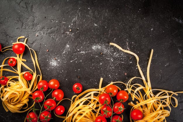 Fresh raw pasta with tomatoes