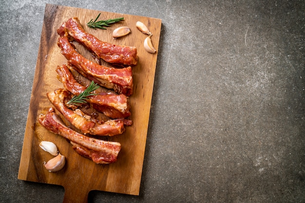 Fresh raw pork ribs ready for roasting with ingredients