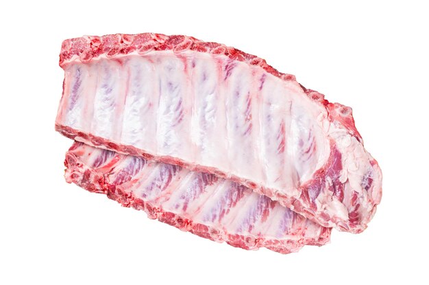 Foto costole fresche di lombo di maiale crudo in un vassoio d'acciaio con erbe sullo sfondo bianco isolato