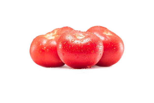 Fresh raw red tomatoes isolated on white