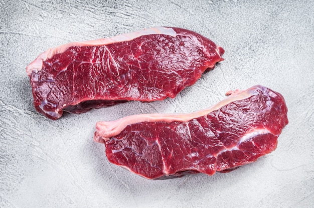 Fresh Raw sirloin beef meat steak. white background.