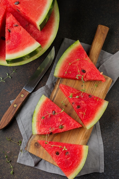 Fresh raw watermelon on a grey table