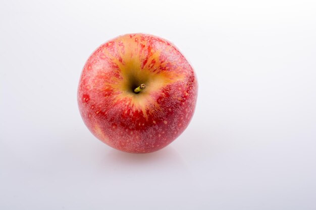 Fresh red apple on white background