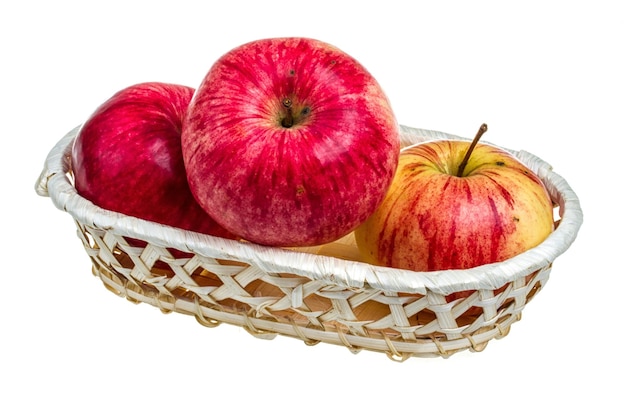 fresh red apples in the dish isolated on white background