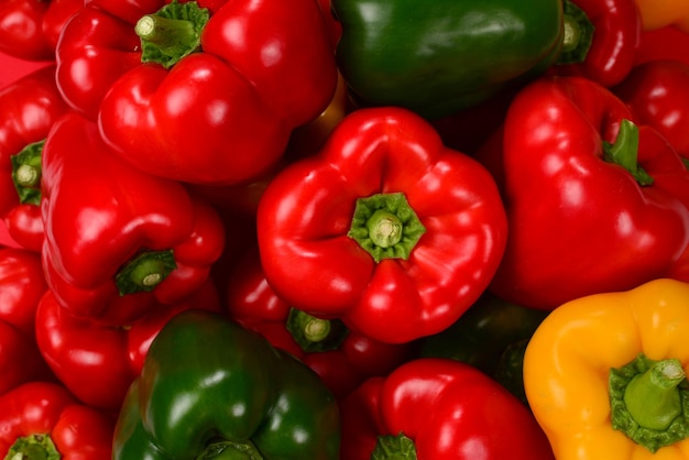 Fresh red green yellow bell pepper background