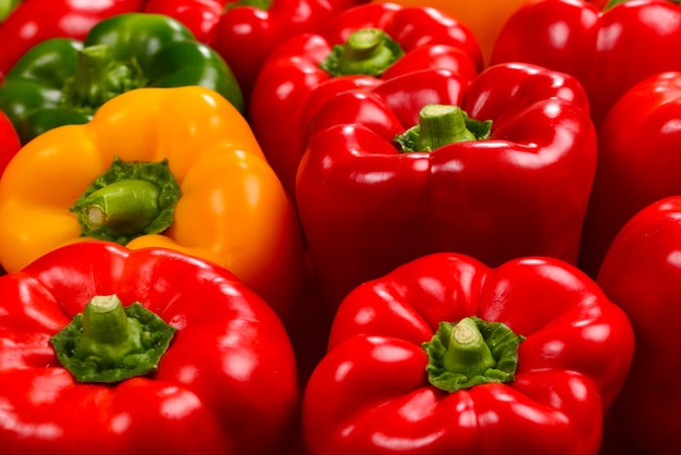 Fresh red, green, yellow bell pepper background.