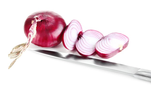 Fresh red onions and knife isolated on white