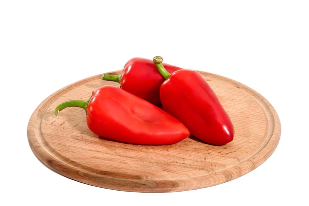 Fresh red pepper paprika n a white background