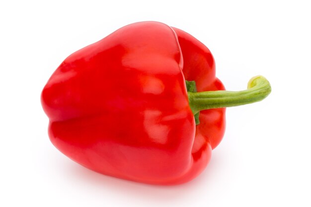 Fresh red pepper on white surface, isolated.