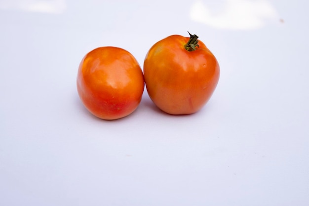 Fresh Red Ripe Tomato Isolated On Background Natural Raw organic healthy vegetable Salad