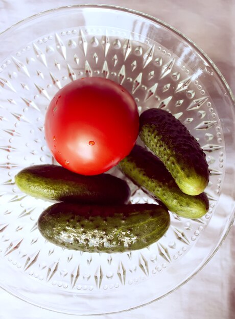 Fresh red ripe tomatoes and cucumbers