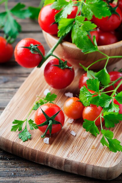 Fresh red tomato with green parsley