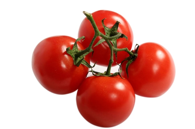 Fresh red tomatoes isolated on white background