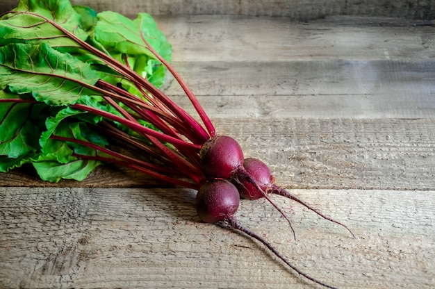 Fresh Ripe Beet on Old Wooden Table. Organic Food.