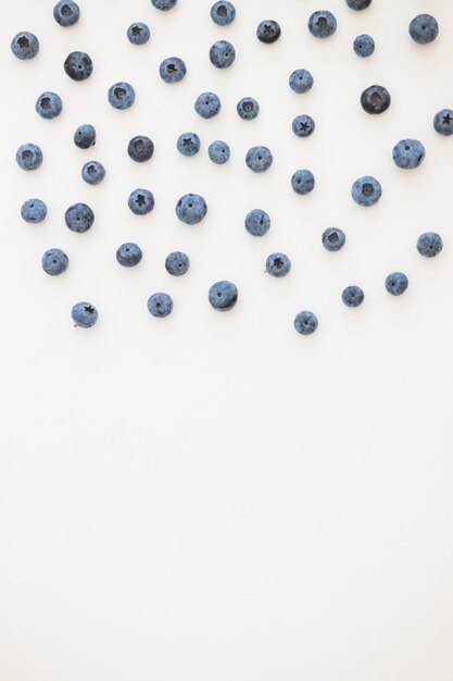 Fresh ripe blueberries berries on white