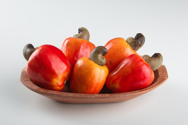 Fresh ripe cashew fruits isolated with white background.