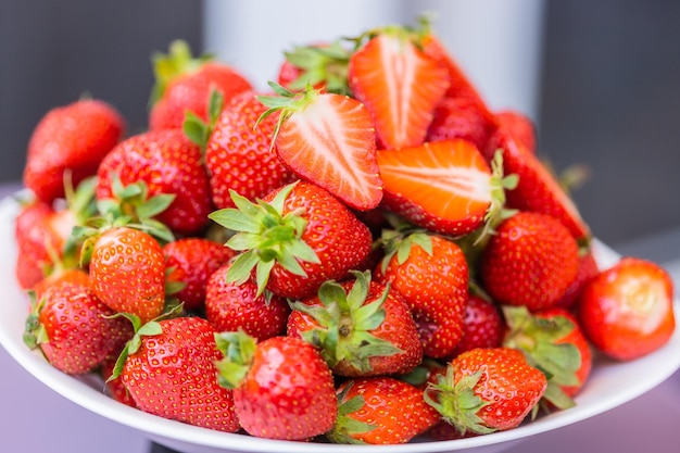 Fresh ripe delicious strawberries in bowl healthy food and vegetarian