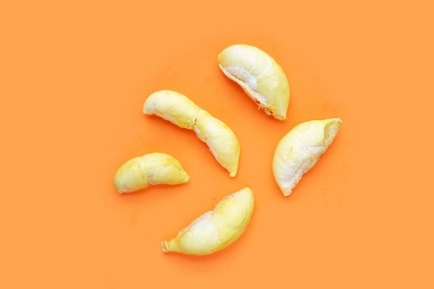 Fresh ripe durian on orange background