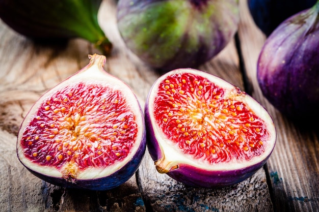 Fresh ripe figs closeup on a wooden background