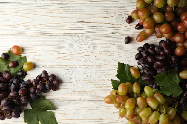 Fresh ripe grape on white wooden