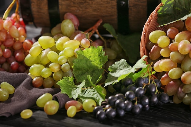 Fresh ripe grapes on table