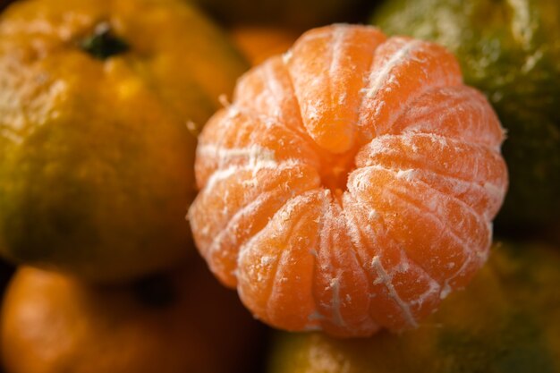 Fresh ripe mandarins background close up, macro, selective focus