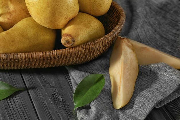 Fresh ripe pears on wooden table