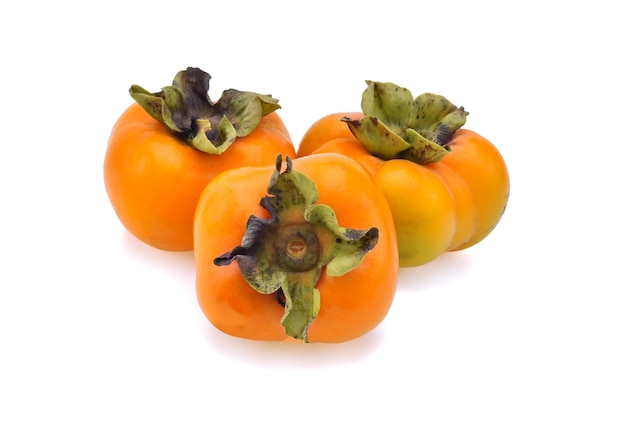 Fresh ripe persimmons isolated