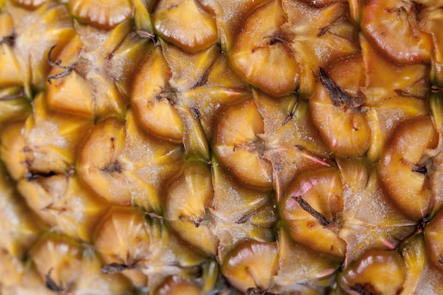 Fresh ripe pineapple texture, close up view