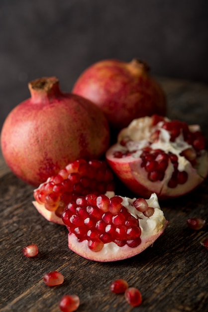 Fresh ripe pomegranate on a wooden