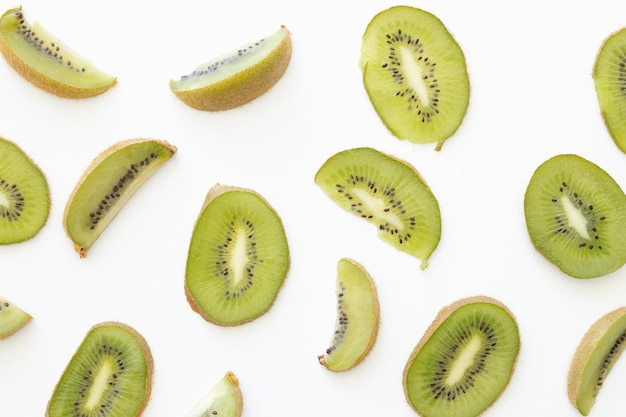 Fresh and ripe sliced kiwi on the white background