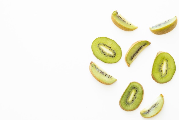 Fresh and ripe sliced kiwi on the white background