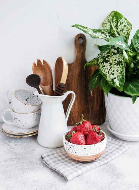 Fresh ripe strawberries on the kitchen table