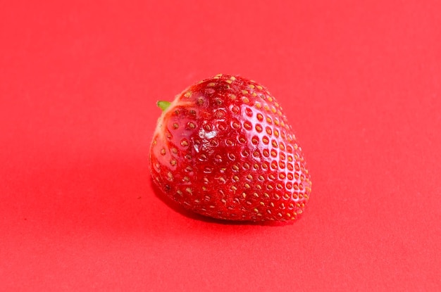 Fresh Ripe Strawberry Fruit on a Colored Background