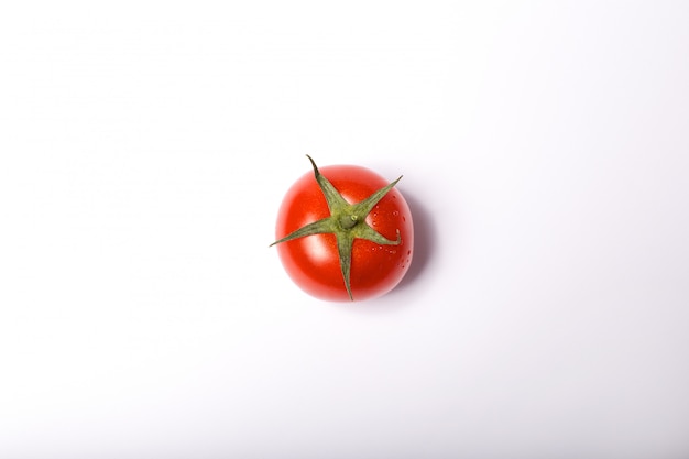 Fresh ripe tomato close up top view