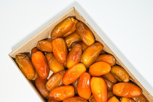 Fresh ripe yellow dates, fresh dates ruthob isolated on white background