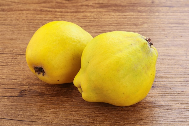 Fresh ripe yellow quince fruit