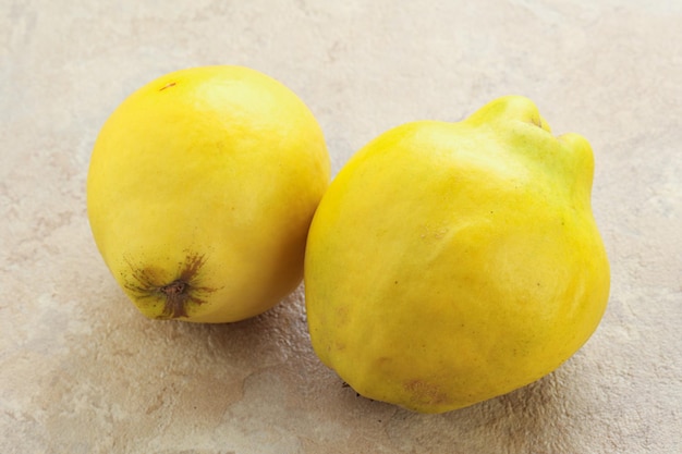 Fresh ripe yellow quince fruit