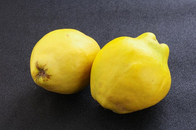 Fresh ripe yellow quince fruit