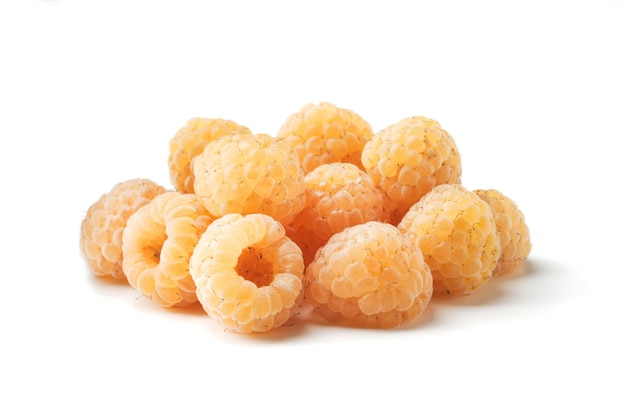 Fresh ripe yellow raspberries on a white background