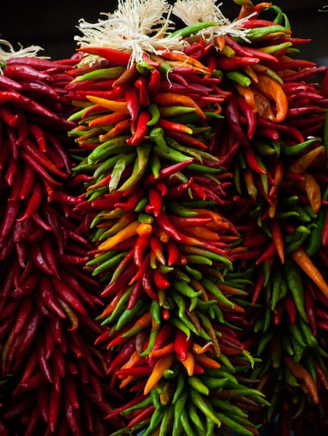 Fresh rista on display at the local farmers market. legend has it, in the southwest, that hanging chili ristras brings good luck if hung at the entrance of the home