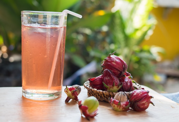 fresh roselle drink on wooden table