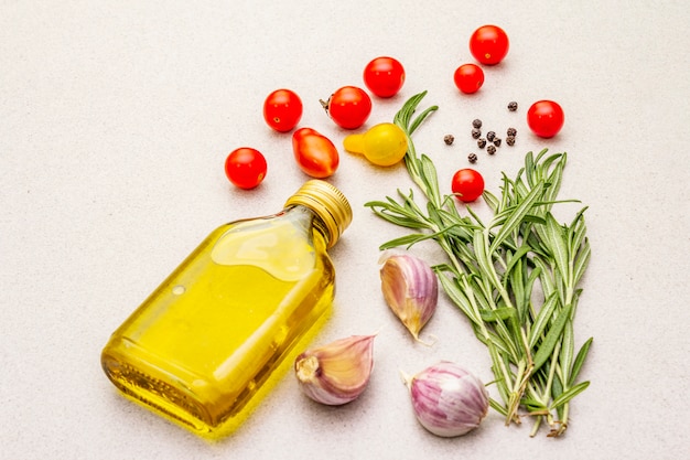 Fresh rosemary, garlic clove, olive oil, black pepper