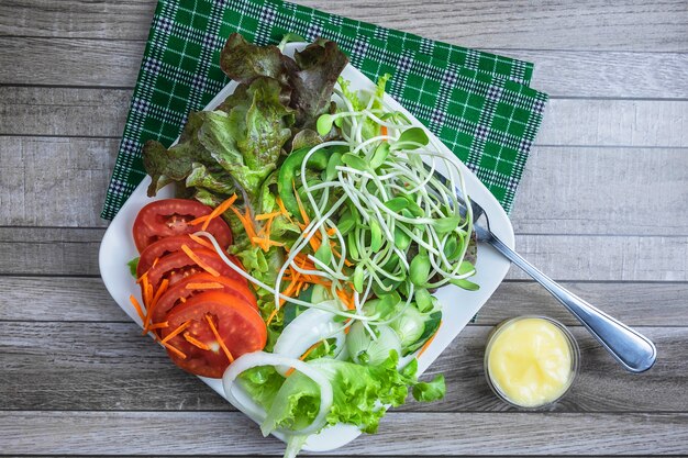 Fresh salad  and tomato. Top view 