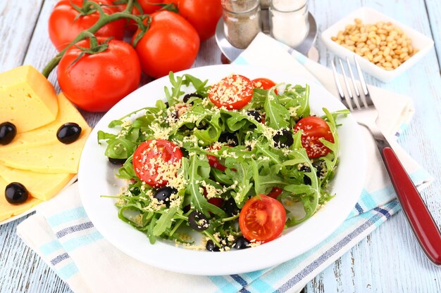 Fresh salad with arugula close up